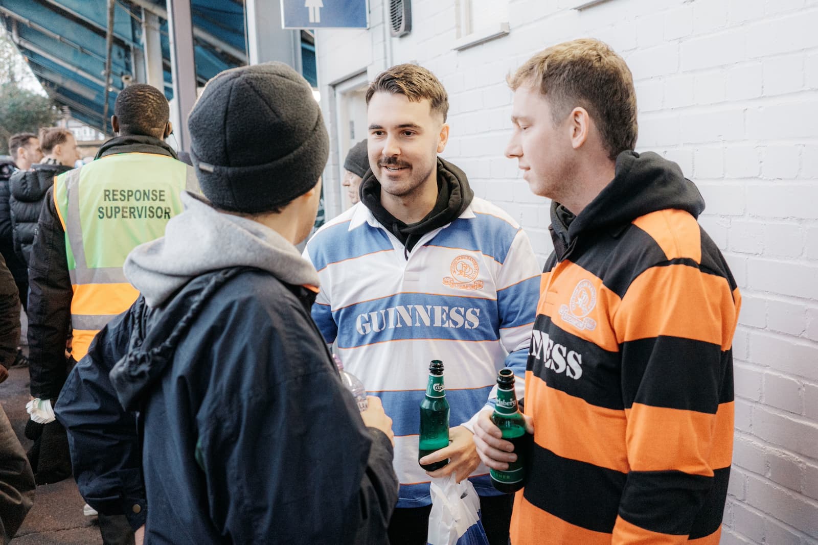 Fans chatting at half time