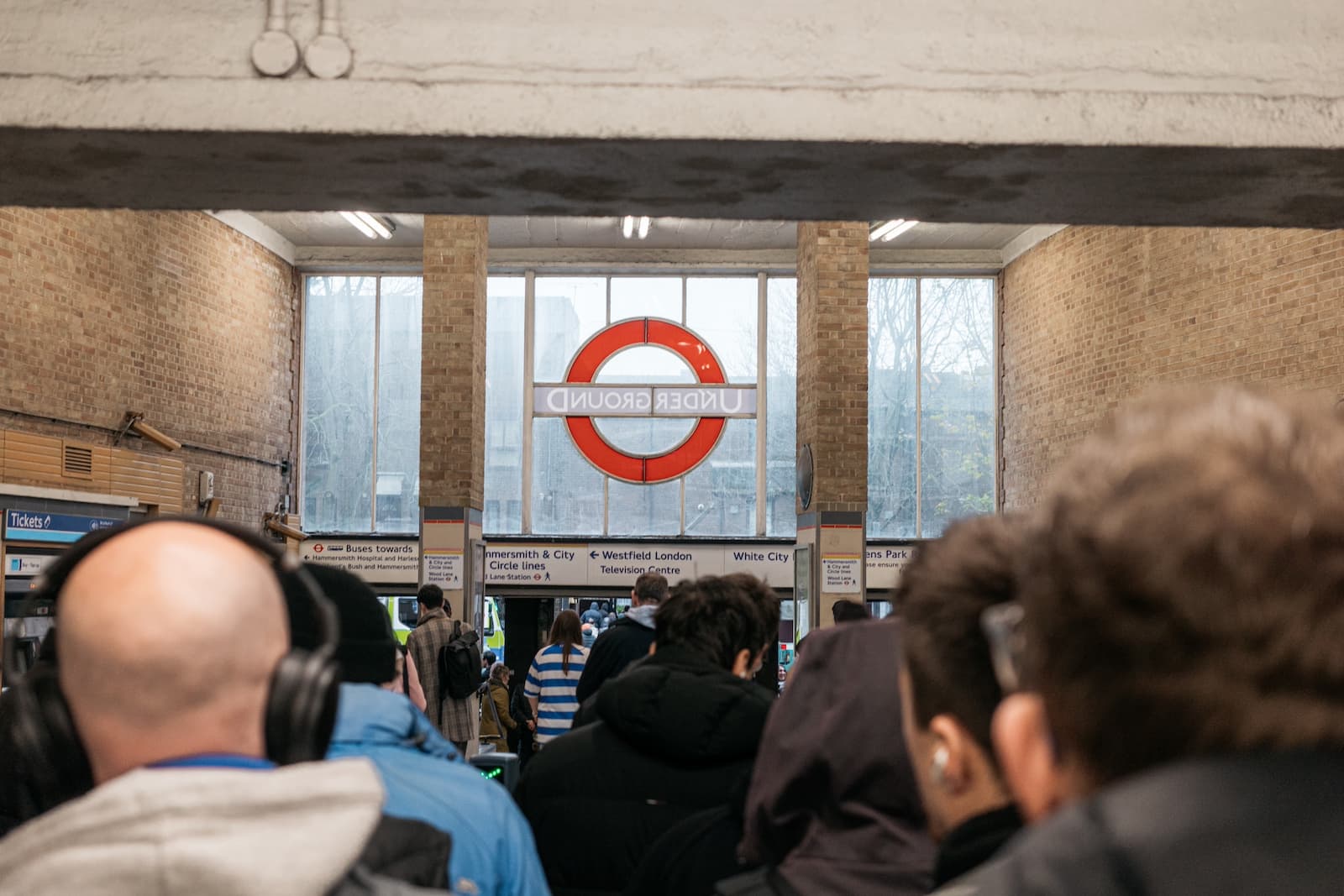 Fans emerging from the train station